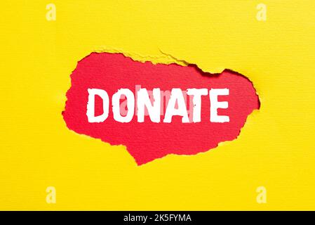 Affiche manuscrite Donate. Un mot écrit sur un don à un organisme de bienfaisance au profit d'une cause peut répondre à des besoins médicaux Banque D'Images