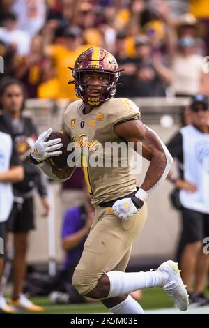 Arizona State course de retour X Valladay (1) dirige le ballon pour un touchdown dans le deuxième quart d'un match de football universitaire NCAA contre le Washington Banque D'Images