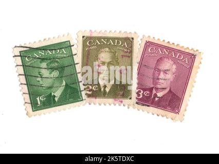 Montage de timbres-poste d'époque du Canada sur fond blanc. Banque D'Images