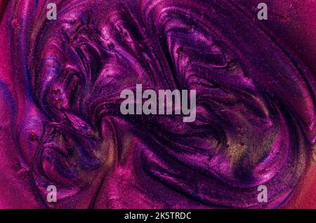 Motif d'arrière-plan abstrait dans les couleurs rose néon et violet. Texture aérée et paillettes étincelantes. Clair et foncé, contrastes. Texture au pair étincelant Banque D'Images