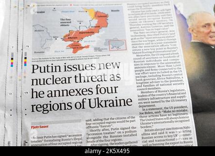 "Poutine publie une nouvelle menace nucléaire alors qu'il annexe quatre régions d'Ukraine" le journal Guardian titre 30 septembre 2022 Londres UK Banque D'Images