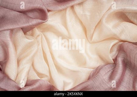 Texture textile, arrière-plan abstrait, couleurs beige rose Banque D'Images