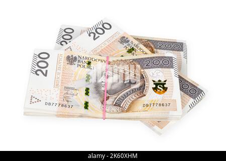 Paquets de billets polonais de 200 zlotys. Isolé sur blanc. Masque inclus. Banque D'Images