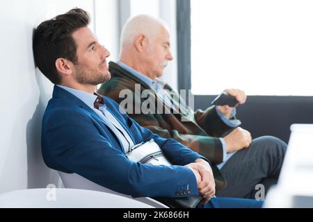 hommes d'affaires dans la salle d'attente Banque D'Images