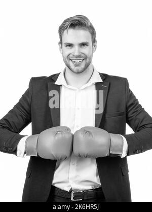 Homme d'affaires heureux tient des gants de boxe ensemble prêt à combattre isolé sur blanc, combat Banque D'Images