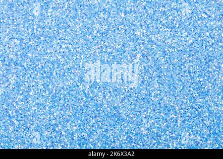 Texture holographique à paillettes bleu clair. Bleu lumières étincelantes fond de fête avec texture. Résumé Noël scintillant brillant bokeh flou et Banque D'Images