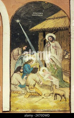 La naissance de Jésus Christ - fresque sur l'extérieur d'une église orthodoxe en Roumanie Banque D'Images