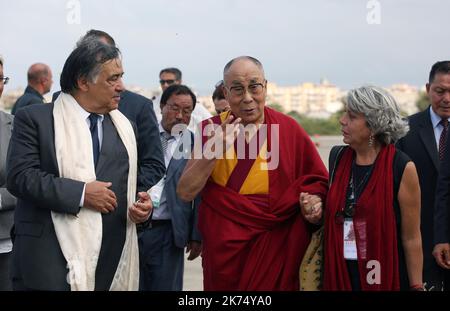 Palermo, arrival of the Dalai Lama in Palermo at Bocca di Falco airport. In the picture the Dalai Lama welcomed by the mayor of Palermo Leoluca Orlando. 17/09/2017, Palermo, Italy Stock Photo