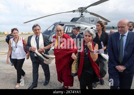 Palermo, arrival of the Dalai Lama in Palermo at Bocca di Falco airport. In the picture the Dalai Lama welcomed by the mayor of Palermo Leoluca Orlando. 17/09/2017, Palermo, Italy Stock Photo