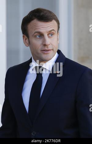 Le président français Emmanuel Macron revient à l'Elysée Palace après la réunion de haut niveau sur les défis du multilatéralisme avec le président chinois, la chancelière allemande et le président de la Commission européenne à Paris, en France. 26.03.2019 Banque D'Images