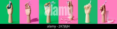 Ensemble de mains de mannequin en bois avec différents articles sur fond de couleur Banque D'Images