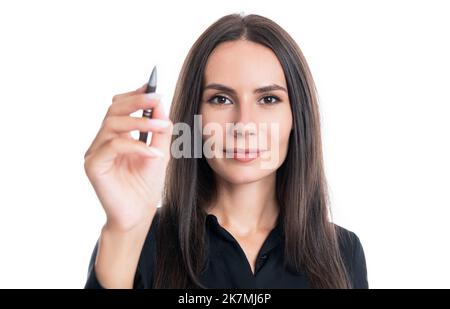 Femme d'affaires écrivant sur un écran invisible. Portrait d'une femme prétendant écrire avec un stylo Banque D'Images