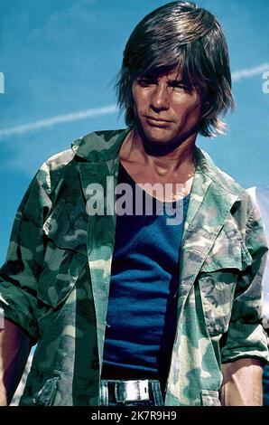 Jan-Michael Vincent film: Damnation Alley (1975) personnages: Tanner Directeur: Jack Smay 21 octobre 1977 **AVERTISSEMENT** cette photographie est destinée à un usage éditorial seulement et est le droit d'auteur de 20 CENTURY FOX et/ou le photographe assigné par la Société de film ou de production et ne peut être reproduite que par des publications dans le cadre de la promotion du film ci-dessus. Un crédit obligatoire à 20 CENTURY FOX est requis. Le photographe doit également être crédité lorsqu'il est connu. Aucune utilisation commerciale ne peut être accordée sans l'autorisation écrite de la Société du film. Banque D'Images