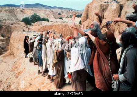 Eric Idle film: Monty Python'S Life of Brian (UK 1979) personnages: M. Cheeky / Stan (Loretta) / Harry The Haggler / coupable femme / Warris / intensément terne Jeunesse / jailer's Assistant / Otto / chanteur Crucifee Directeur: Terry Jones 17 août 1979 **AVERTISSEMENT** cette photographie est destinée à un usage éditorial exclusif et est le copyright de PYTHON et/ou le photographe attribué par la Société de film ou de production et ne peut être reproduite que par des publications en conjonction avec la promotion du film ci-dessus. Un crédit obligatoire pour PYTHON est requis. Le photographe doit également être crédité lorsqu'il est connu. Non Banque D'Images