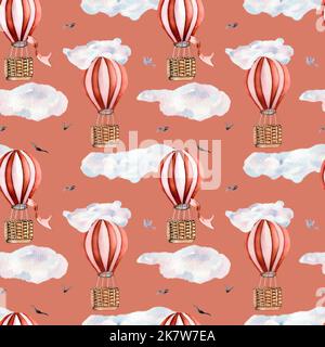 Ballons rétro à air chaud style vintage aquarelle illustration sans couture motif sur corail. Ballon dans le ciel de style vintage peint à la main. Mignonne puérile d Banque D'Images