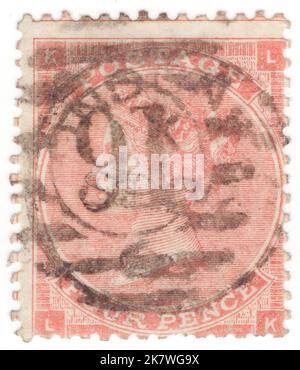 ROYAUME-UNI - 1862: Un timbre-poste de 4 pence vermilion montrant le portrait de la reine Victoria Banque D'Images