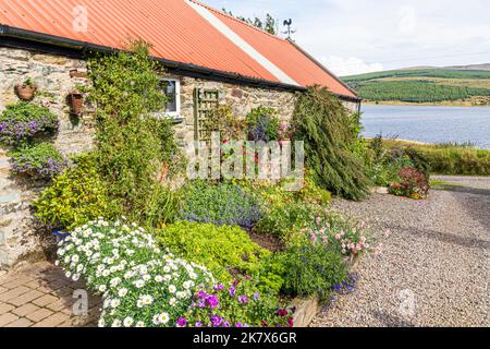 Corrylach Farm à l'extrémité nord du Loch Lussa sur la péninsule de Kintyre, Argyll & Bute, Écosse, Royaume-Uni Banque D'Images