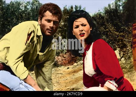 Franco Nero & Muriel Franklin film: The Trampers (GLI UOMINI DAL PASSO PESANTE) personnages: Charley Garvey, Alice Cordeen IT/FR 1965, / Titel Auch: 'Die UM Gnade Winseln' Directeur: Albert Band & Mario Sequi 31 décembre 1965 **AVERTISSEMENT** cette photographie est destinée à un usage éditorial exclusif et est protégée par les droits d'auteur D'INTER-VERLEIH et/ou du photographe attribué par la Société de film ou de production et ne peut être reproduite que par des publications dans le cadre de la promotion du film ci-dessus. Un crédit obligatoire pour INTER-VERLEIH est requis. Le photographe doit également être crédité lorsqu'il est connu. Pas de commercial u Banque D'Images