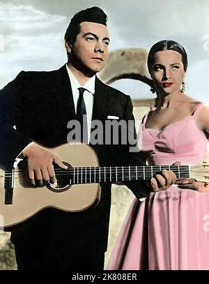 Mario Lanza & Sarita Montiel film Serenade (1954) personnages : Damon Vincenti & 23 mars 1956 **AVERTISSEMENT** cette photographie est réservée à un usage éditorial et est protégée par les droits d'auteur de la Société cinématographique et/ou du photographe désigné par la Société cinématographique ou la Société de production et ne peut être reproduite que par des publications dans le cadre de la promotion du film ci-dessus. Un crédit obligatoire à The film Company est requis. Le photographe doit également être crédité lorsqu'il est connu. Aucune utilisation commerciale ne peut être accordée sans autorisation écrite de The film Company. Banque D'Images