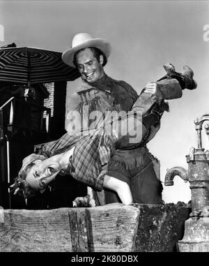 Jan Sterling & Charlton Heston film: Pony Express (USA 1953) personnages: Denny Russell, capitaine William Frank 'Buffalo Bill' Cody Directeur: Jerry Hopper 05 juin 1953 **AVERTISSEMENT** cette photographie est destinée à un usage éditorial seulement et est le droit d'auteur des IMAGES PARAMOUNT et/ou du photographe assigné par la Société de film ou de production et ne peut être reproduite que par des publications en conjonction avec la promotion du film ci-dessus. Un crédit obligatoire pour LES PHOTOS PARAMOUNT est requis. Le photographe doit également être crédité lorsqu'il est connu. Aucune utilisation commerciale ne peut être accordée sans autorisation écrite de Banque D'Images