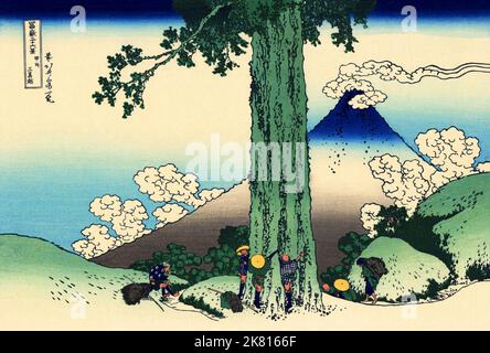 Japon: «Col de Mishima dans la province de Kai».Imprimé Ukiyo-e en blocs de bois de la série «trente-six vues du Mont Fuji» de Katsushika Hokusai (31 octobre 1760 - 10 mai 1849), c.1830. «36 vues du Mont Fuji» est une série «ukiyo-e» de grandes gravures sur bois de l'artiste Katsushika Hokusai.La série représente le Mont Fuji dans différentes saisons et conditions météorologiques à partir de divers endroits et distances.Il se compose en fait de 46 tirages créés entre 1826 et 1833.Les 36 premiers ont été inclus dans la publication originale et, en raison de leur popularité, 10 autres ont été ajoutés après la publication originale. Banque D'Images