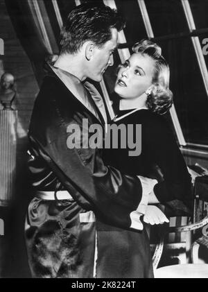 KIRK Douglas & Lola Albright film: Champion (USA 1949) personnages: Michael 'Midge' Kelly, Palmer Harris Directeur: Mark Robson 09 avril 1949 **AVERTISSEMENT** la présente photographie est destinée à un usage éditorial exclusif et est le droit d'auteur des ARTISTES UNIS et/ou du photographe assigné par la Société de film ou de production et ne peut être reproduite que par des publications dans le cadre de la promotion du film ci-dessus. Un crédit obligatoire pour LES ARTISTES UNIS est requis. Le photographe doit également être crédité lorsqu'il est connu. Aucune utilisation commerciale ne peut être accordée sans l'autorisation écrite de la Société du film. Banque D'Images