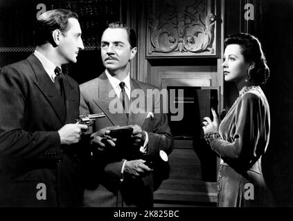 Basil Rathbone, William Powell & Hedy Lamarr film : Crossroads (1947) personnages : Henri Sarrou, David Talbot, alias Jean Pelletier, Lucienne Talbot Directeur : Jack Conway 01 juillet 1942 **AVERTISSEMENT** cette photo est destinée à un usage éditorial exclusif et est le droit d'auteur de MGM et/ou du photographe assigné par la Société de film ou de production et ne peut être reproduite que par des publications en conjonction avec la promotion du film ci-dessus. Un crédit obligatoire pour MGM est requis. Le photographe doit également être crédité lorsqu'il est connu. Aucune utilisation commerciale ne peut être accordée sans l'autorisation écrite de la Société du film Banque D'Images