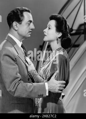 William Powell & Hedy Lamarr film: Crossroads (1945) personnages: David Talbot, Alias Jean Pelletier et Lucienne Talbot 01 juillet 1942 **AVERTISSEMENT** cette photographie est destinée à un usage éditorial exclusif et est protégée par les droits d'auteur de MGM et/ou du photographe attribué par la Société de film ou de production et ne peut être reproduite que par des publications dans le cadre de la promotion du film ci-dessus. Un crédit obligatoire pour MGM est requis. Le photographe doit également être crédité lorsqu'il est connu. Aucune utilisation commerciale ne peut être accordée sans l'autorisation écrite de la Société du film. Banque D'Images