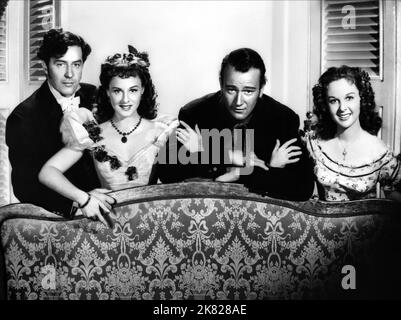 Ray Milland, Paulette Goddard, John Wayne & Susan Hayward film: Reap the Wild Wind (USA 1942) personnages: Stephen 'Steve' Tolliver, Loxi Claiborne, capitaine Jack Stuart, cousin Drusilla Alston / Verfilmung eines Zeitungsartikels (basé sur Un samedi soir par Thelma Strabel) Directeur: Cecil B. DeMille 18 mars 1942 **AVERTISSEMENT** cette photographie est destinée à un usage éditorial exclusif et est protégée par les droits d'auteur des IMAGES ET/ou du photographe assigné par la Société de film ou de production et ne peut être reproduite que par des publications en conjonction avec la promotion du film ci-dessus. Un homme Banque D'Images