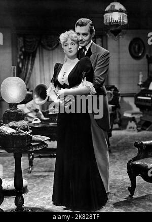 Lana Turner & Clark Gable film Honky Tonk (USA 1941) personnages : Elizabeth Cotton, 'Candy' Johnson réalisateur : Jack Conway 01 octobre 1941 **AVERTISSEMENT** cette photographie est à usage éditorial seulement et est la propriété de MGM et/ou du photographe assigné par le film ou la société de production et ne peut être reproduite que par des publications en liaison avec la promotion du film ci-dessus. Un crédit obligatoire à MGM est requis. Le photographe doit également être crédité lorsqu'il est connu. Aucune utilisation commerciale ne peut être accordée sans autorisation écrite de The film Company. Banque D'Images