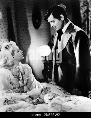 Lana Turner & Clark Gable film Honky Tonk (USA 1941) personnages : Elizabeth Cotton, 'Candy' Johnson réalisateur : Jack Conway 01 octobre 1941 **AVERTISSEMENT** cette photographie est à usage éditorial seulement et est la propriété de MGM et/ou du photographe assigné par le film ou la société de production et ne peut être reproduite que par des publications en liaison avec la promotion du film ci-dessus. Un crédit obligatoire à MGM est requis. Le photographe doit également être crédité lorsqu'il est connu. Aucune utilisation commerciale ne peut être accordée sans autorisation écrite de The film Company. Banque D'Images