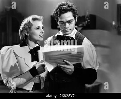 Ilona Massey & Alan Curtis film: The Great Awakening (1947) personnages: Anna, Franz Schubert Directeur: Reinhold Schünzel 10 septembre 1941 **AVERTISSEMENT** cette photographie est à usage éditorial exclusif et est le droit d'auteur de NEW WORLD et/ou le photographe assigné par la Société du film ou de la production et ne peut être reproduite que par des publications dans le cadre de la promotion du film ci-dessus. Un crédit obligatoire pour LE NOUVEAU MONDE est requis. Le photographe doit également être crédité lorsqu'il est connu. Aucune utilisation commerciale ne peut être accordée sans l'autorisation écrite de la Société du film. Banque D'Images