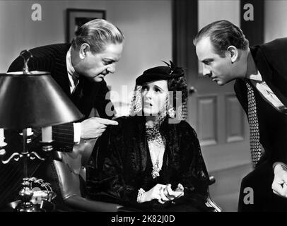 Thurston Hall, Mary Astor & Melvyn Douglas film: Il Y a toujours Une femme (1936) personnages: Procureur de district, Lola Fraser, William Reardon Directeur: Alexander Hall 20 avril 1938 **AVERTISSEMENT** cette photographie est à usage éditorial exclusif et est le droit d'auteur des IMAGES DE COLUMBIA et/ou du photographe assigné par la Société de film ou de production et ne peut être reproduite que par des publications dans le cadre de la promotion du film ci-dessus. Un crédit obligatoire pour LES PHOTOS DE COLUMBIA est requis. Le photographe doit également être crédité lorsqu'il est connu. Aucune utilisation commerciale ne peut être accordée sans autorisation écrite Banque D'Images