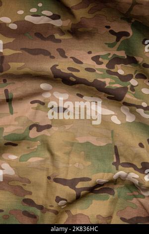 Toile de fond de la texture du tissu camouflage multiple de force armée. Banque D'Images
