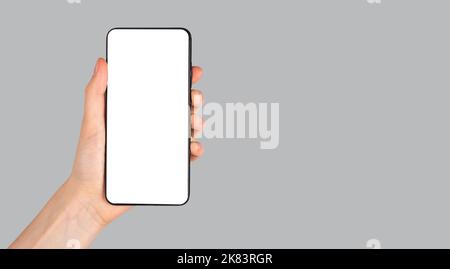 Smartphone portable avec maquette d'écran pour une application de promotion sur téléphone mobile, bannière. Photo de haute qualité Banque D'Images