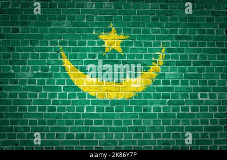Une image de la Mauritanie drapeau peint sur un mur de briques dans une localisation urbaine Banque D'Images