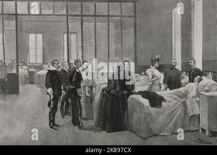 La reine Regent Maria Christina, de Habsburg-Lorraine, rend visite aux soldats blessés rapatriés à l'hôpital del Buen Suceso. Banque D'Images