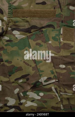 Toile de fond de la texture du tissu camouflage multiple de force armée. Banque D'Images