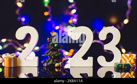 bonne année 2023 fond nouvelle année carte de vacances avec des lumières vives Banque D'Images