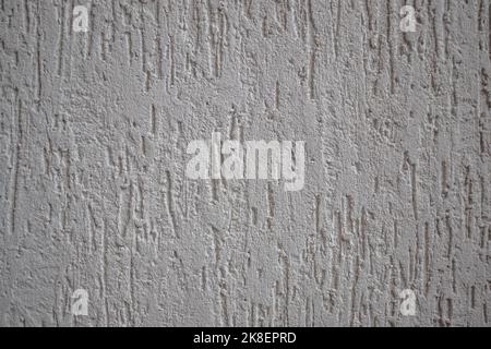 Gris foncé Grunge plâtré mur stuc texture, vertical détaillé naturel rayures grungy gris grossier rustique fond texturé plâtre en béton Patte Banque D'Images