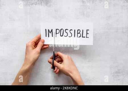 Le mot impossible devient possible. Concept de motivation Banque D'Images