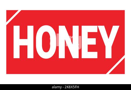 Texte EN MIEL inscrit sur le signe rouge du timbre rectangle. Banque D'Images