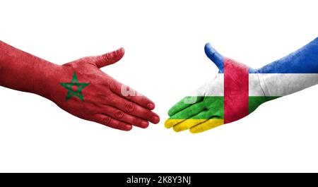 Poignée de main entre la République centrafricaine et le Maroc drapeaux peints sur les mains, image transparente isolée. Banque D'Images