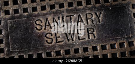 Égout sanitaire homme trou couvercle en fer avec texture et grunge Banque D'Images