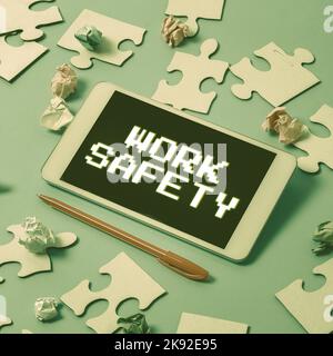 Légende conceptuelle sécurité au travail. Photo conceptuelle mesures préventives appliquées par les entreprises pour protéger la santé des travailleurs Banque D'Images