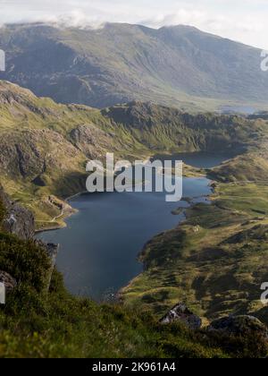 Lever du soleil à Llyn Llydaw à côté de Snowdon, au nord du pays de Galles Banque D'Images