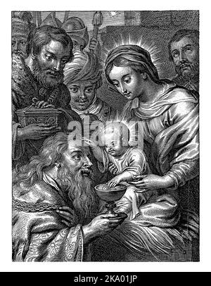 Marie est assise avec l'enfant sur ses genoux. Devant eux les trois rois avec des cadeaux. L'étoile de Bethléem peut être vue par la fenêtre. Banque D'Images