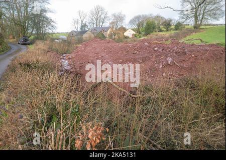 L'agriculteur a reprofilé le cours d'eau en libérant des sédiments dans le cours d'eau, ce qui cause de la pollution Banque D'Images