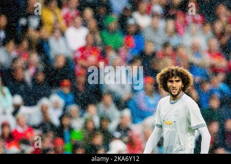 Marouane Fellaini de Manchester United sous la pluie Banque D'Images