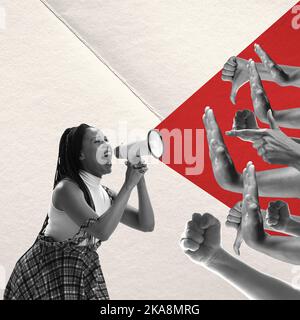 Design créatif. Image conceptuelle. Une jeune femme émotive criant au mégaphone devant les mains humaines montrant un geste de dislike Banque D'Images